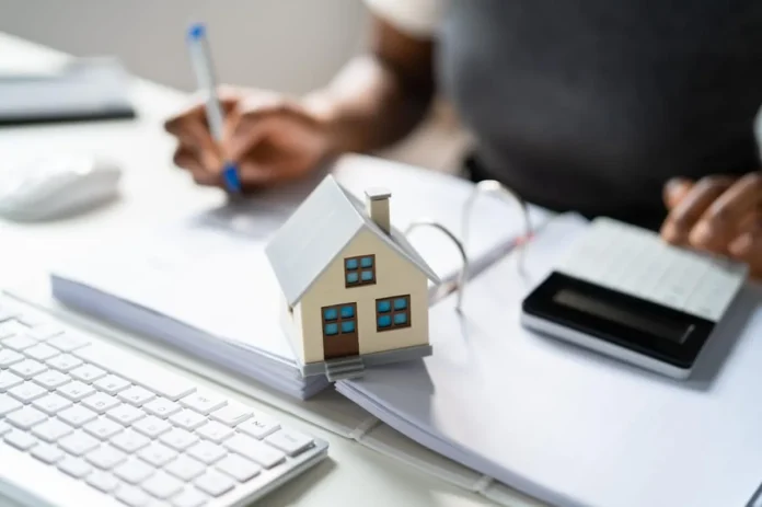 Person-calculating-Durgapur-property-tax_0_1200